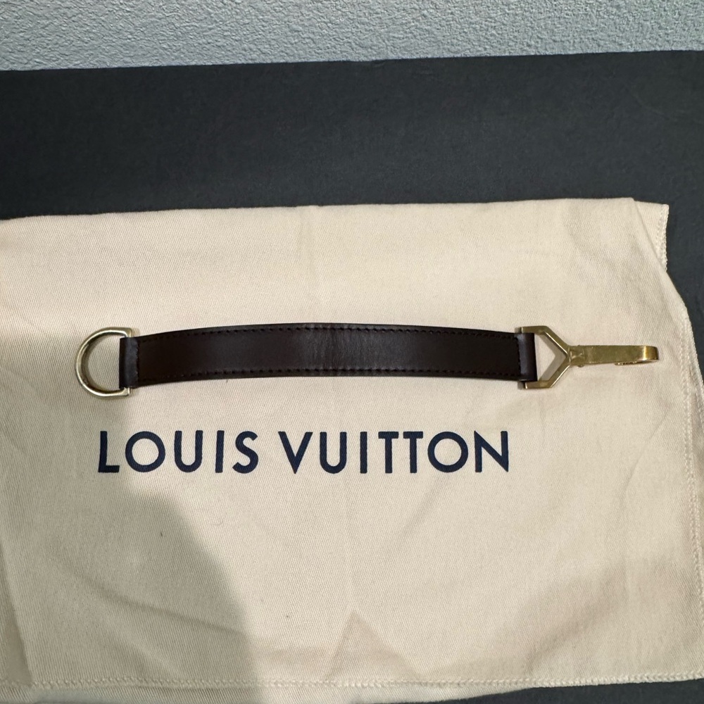 Louis Vuitton Brown Leather Strap with Brass Hardware Bag Holder.